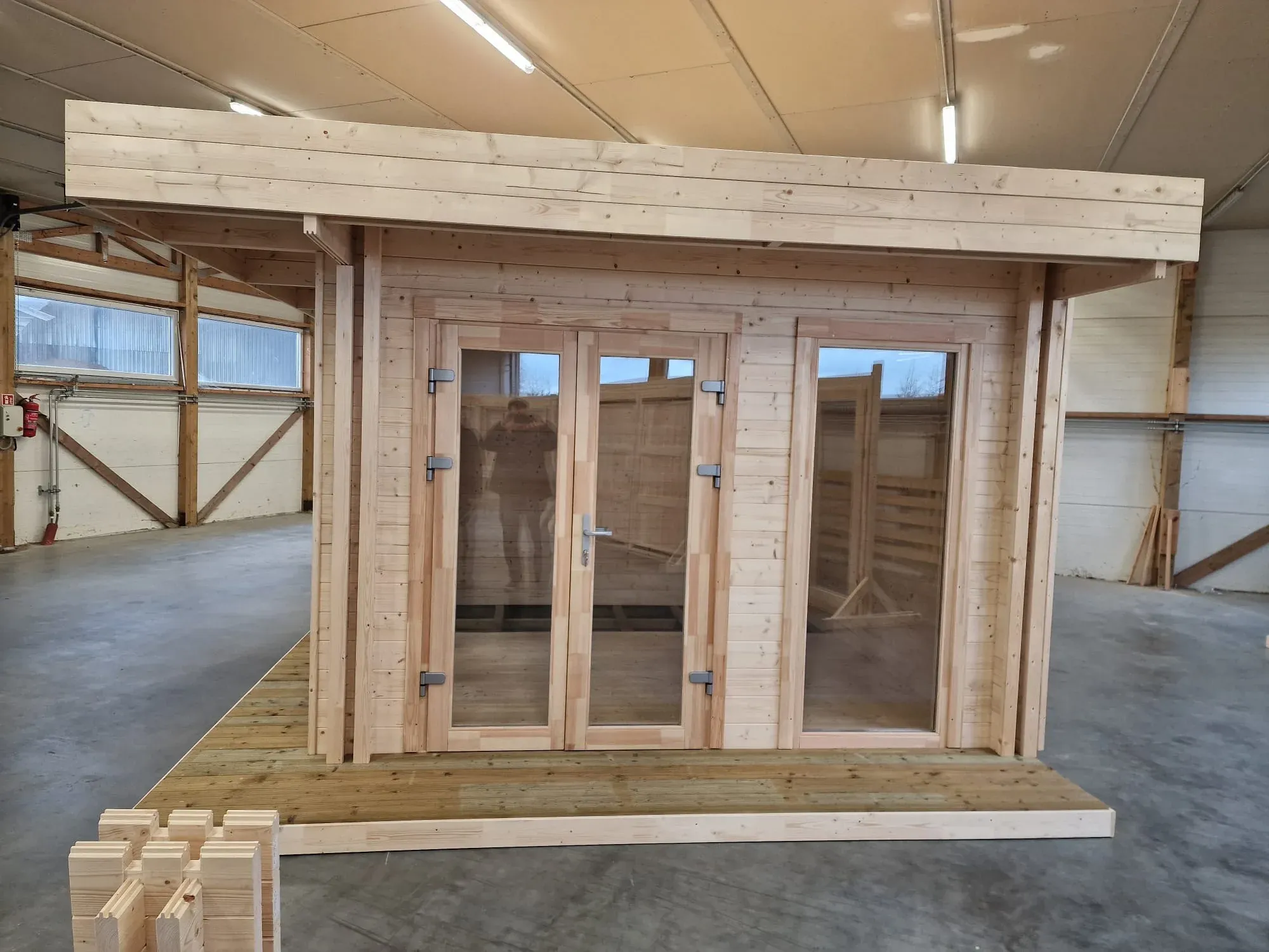 A log cabin assembled inside our factory hall in Vydmantai.